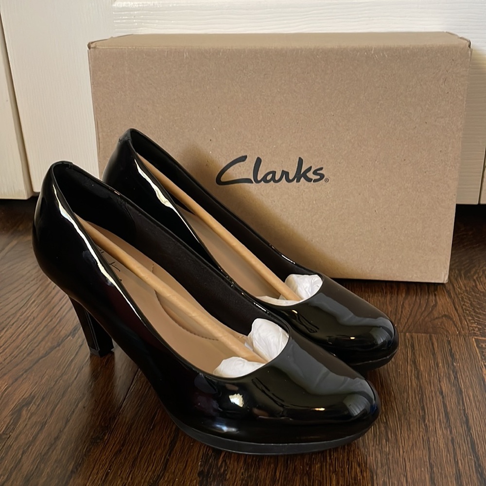 Like New: Clarks Adriel Viola Black Patent Leather Heels.